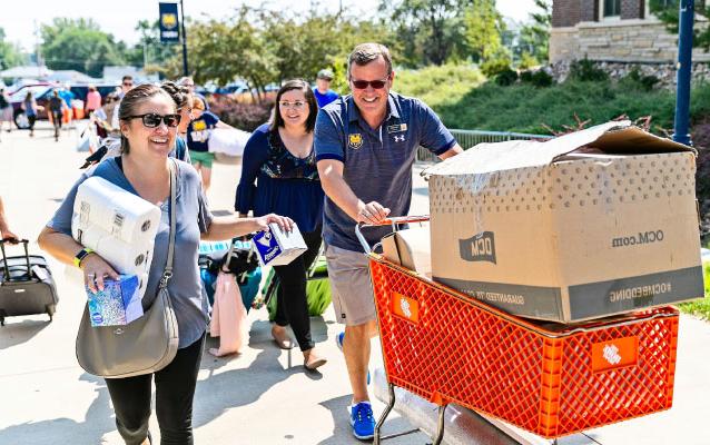 President Feinstein moving students into halls